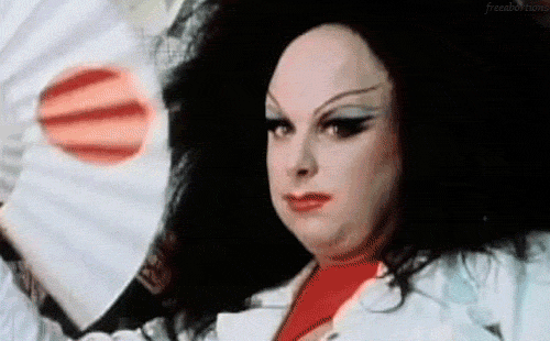 Divine wink and smile gif