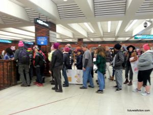 Long line to get into Oakland BART station during Women's March