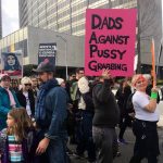 protest sign: Dads Against Pussy Grabbers