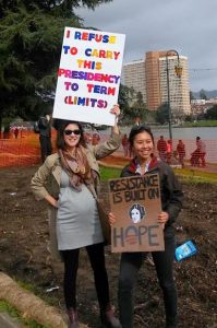 Pregnant woman at Oakland Woman's March carrying protest sign: I refuse to carry this presidency to term (limits)