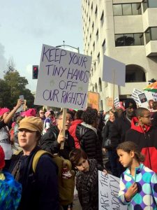 Oakland Women's March 2017 protest sign: Keep your tiny hands off our rights