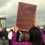 Protest sign at Oakland Women's March: Do you prefer UN-planned parenthood?