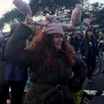 woman in uterus hat at Oakland Women's March